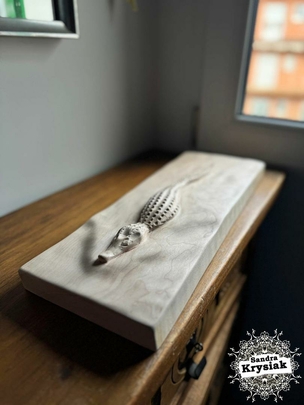 Relieve tallado en madera de lenga. Pablo Romero.