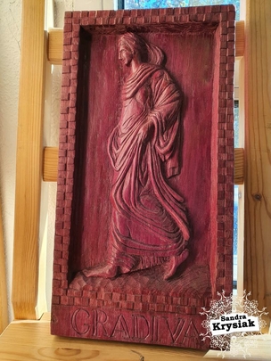 José María. Relieve en madera de amaranto.